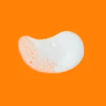 Thumbnail of PanOxyl Acne Foaming Wash suds on an orange background