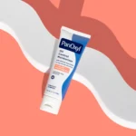 Thumbnail of A tube of PanOxyl Oil Control Moisturizer on a coral background