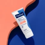 Thumbnail of Squeeze tube of a PanOxyl Balancing Repair Moisturizer on a blue and coral background