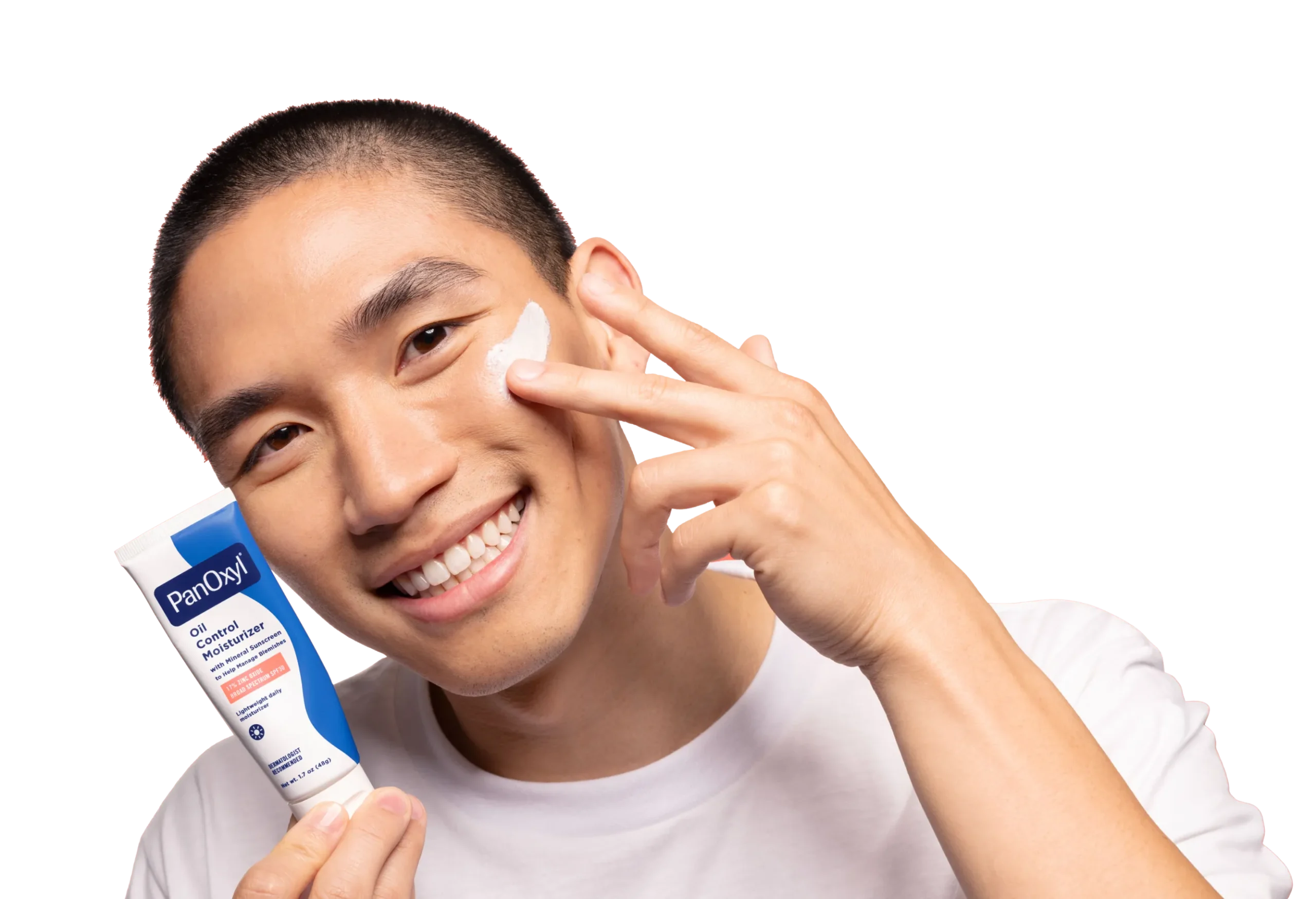 A man putting PanOxyl oil control moisturizer on his face.