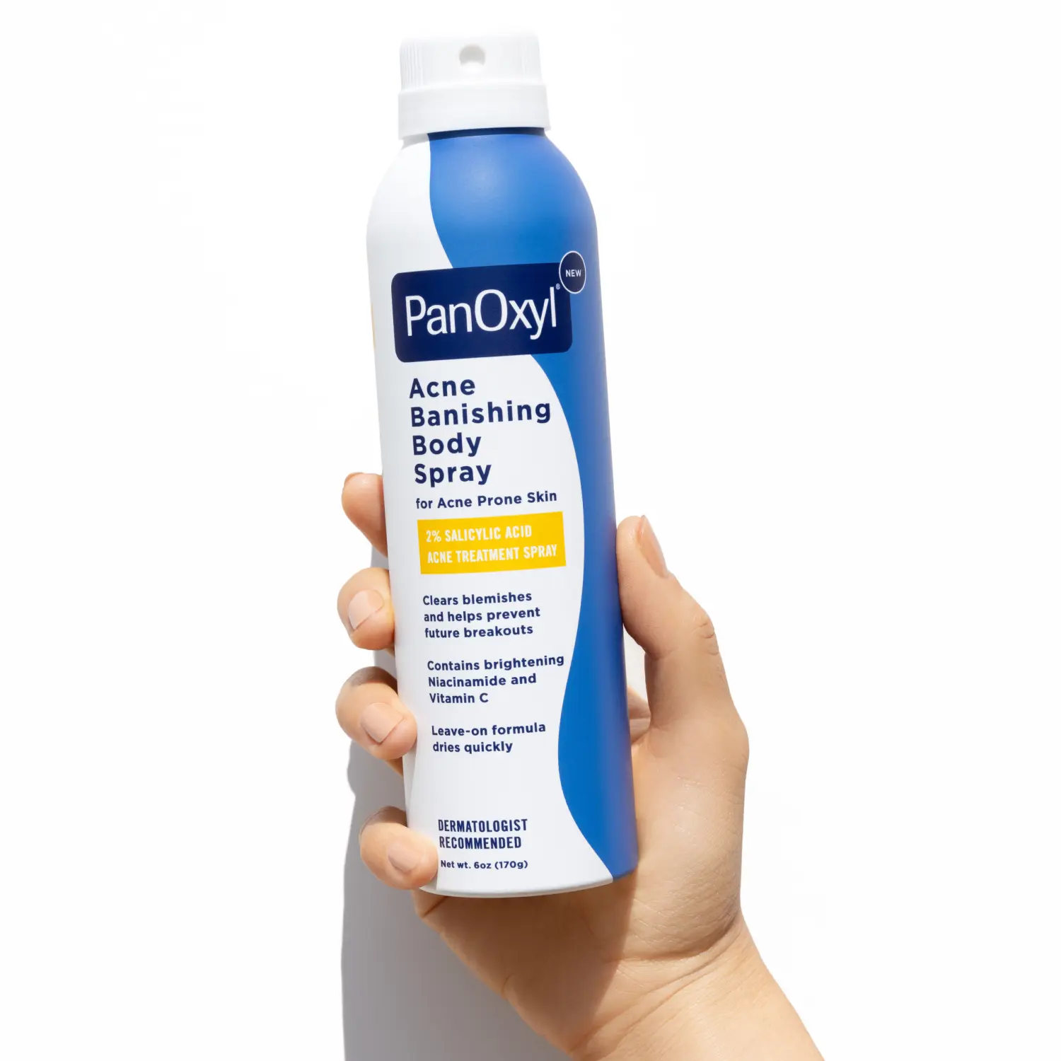 A hand holding a bottle of PanOxyl Acne Banishing Body Spray on a white background